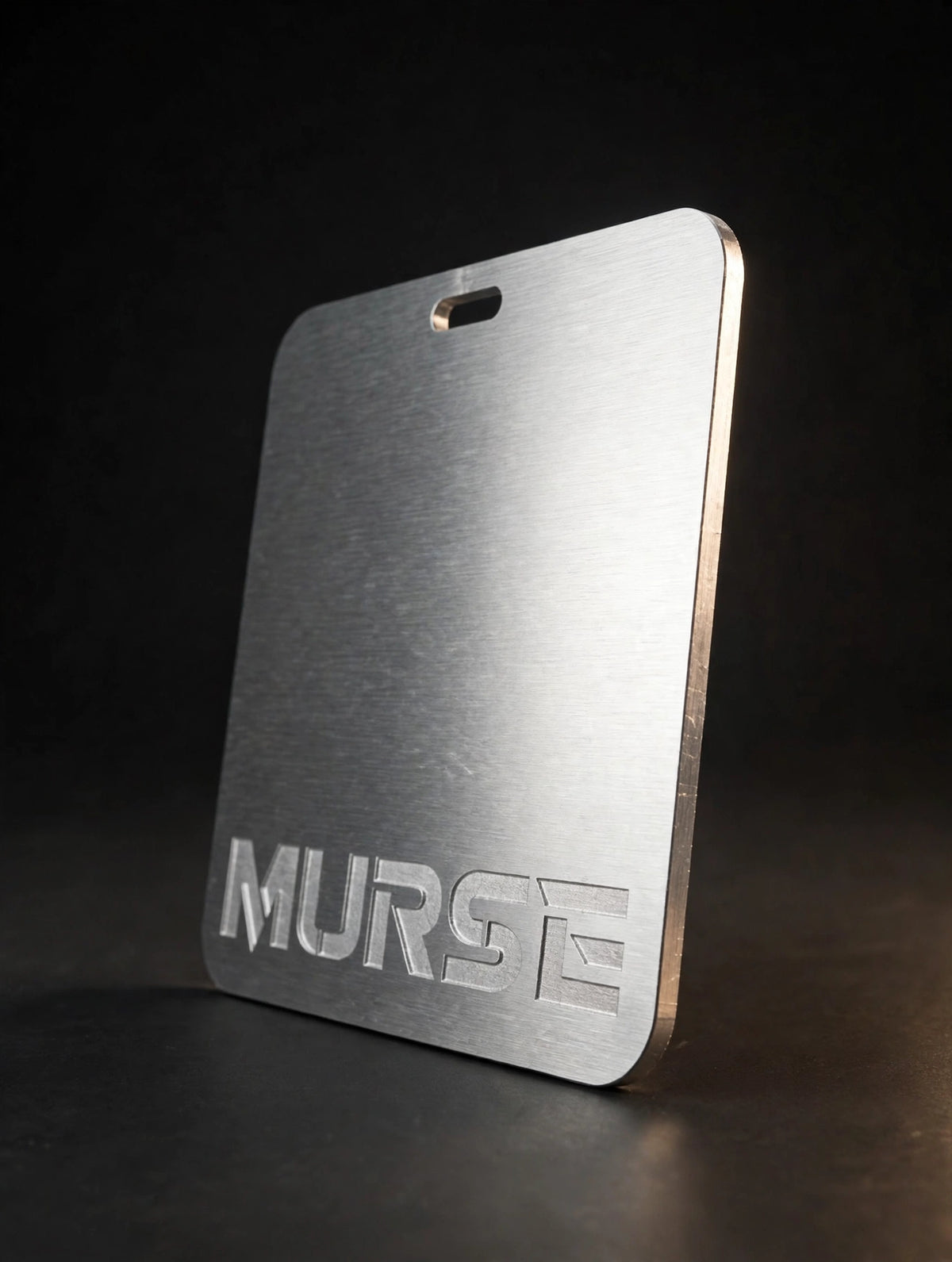 Murse Badge horizontal - side profile showing thin edge on dark background